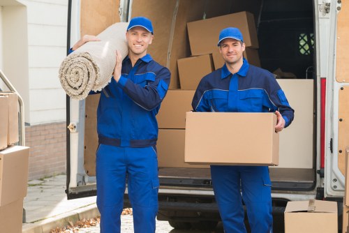 Piano moving equipment and protective wrapping used for a Belmont property