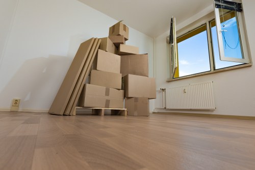 Variety of cardboard boxes and protective packing materials for local moves