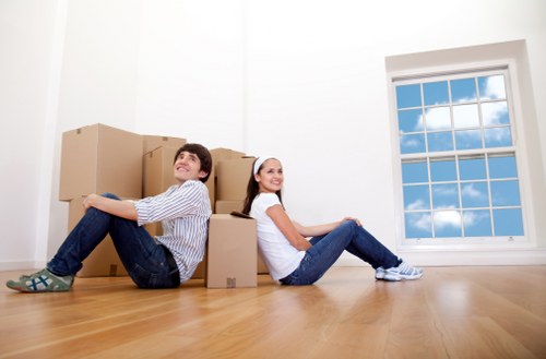 Packed boxes and household items ready for a Belmont flat relocation