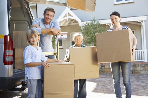 Careful loading of apartment furniture for a Belmont removals job