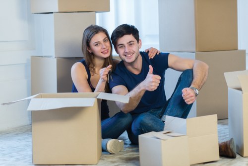 Careful loading of household items during a Belmont removals service