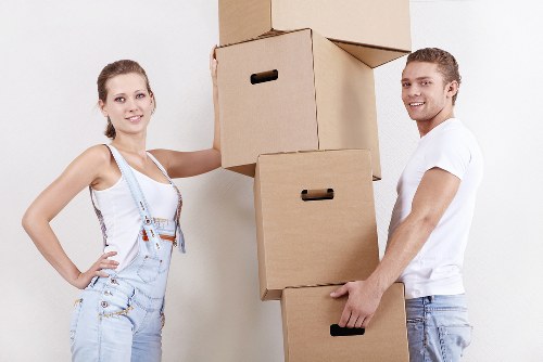 Careful furniture moving through a Belmont property with access challenges