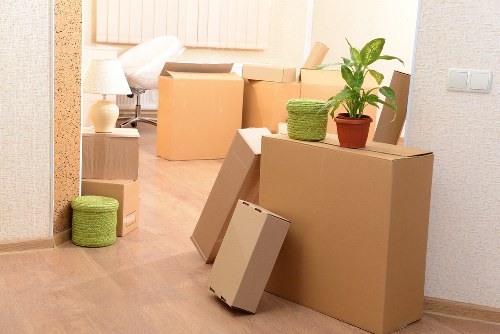 Office furniture and equipment being arranged in a new Belmont workplace